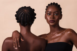 Models Eniola Abolarin and Rebecca Fabunmi, photographed by Remi Adetiba for OLORI Beauty USA's launch campaign